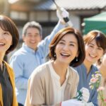 50代の日本人たちが地域活動で楽しそうに交流し、充実した表情を見せている様子。コミュニティ参加による喜びと活力を表現しています。